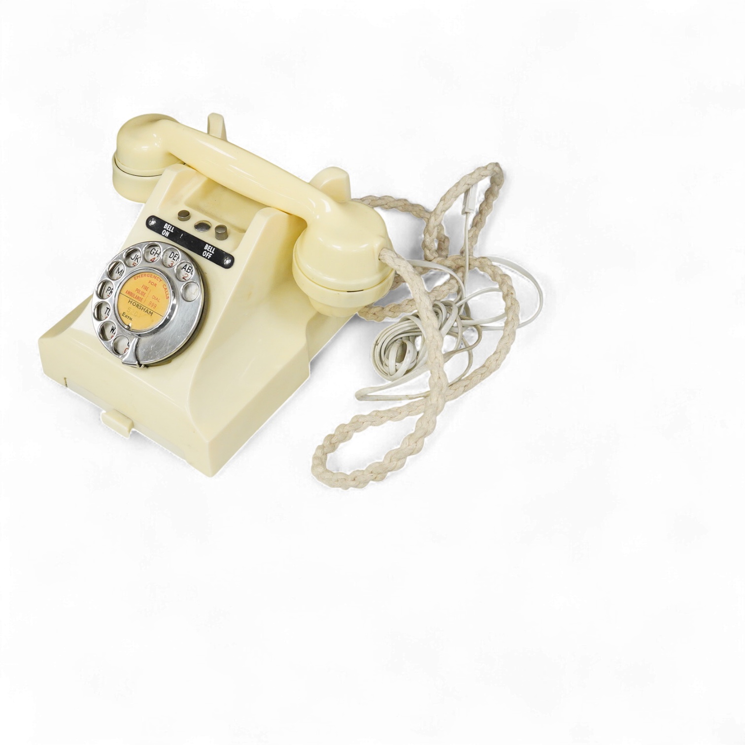 A GPO telephone model 312 in ivory, with a paper centre for a Horsham telephone number, the handset moulded with 164 56 under the grip, with some restoration and adaptations